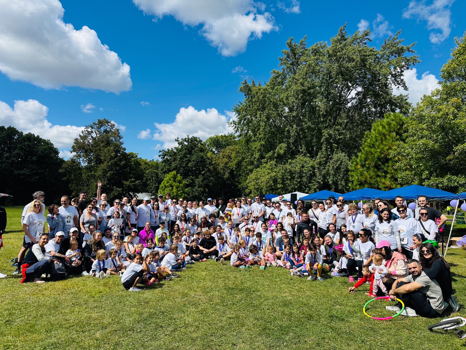 Group photo of all participants on the field
